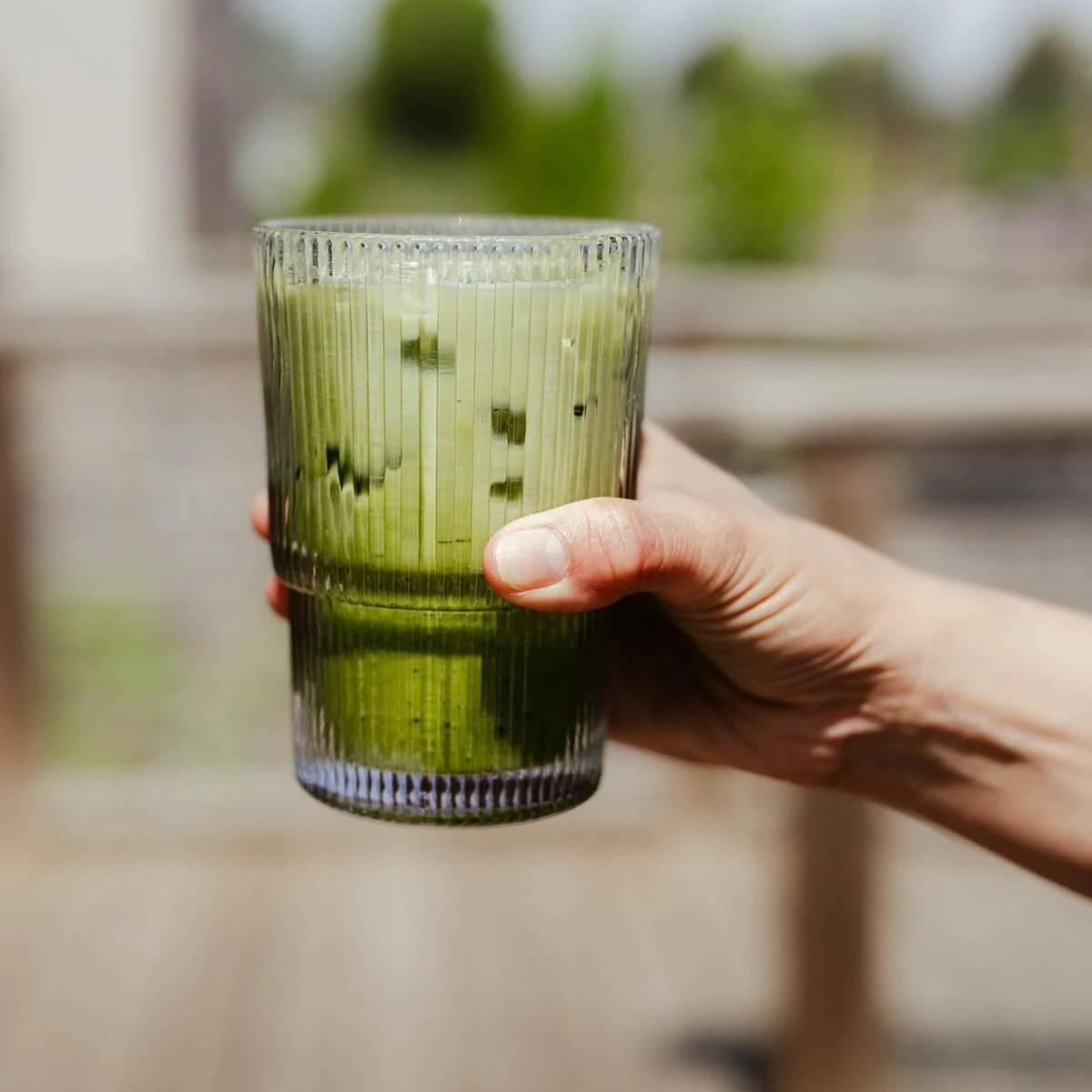 A layered green matcha drink, sample photograph